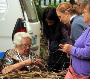 Aunty Dot Peters demonstrates basket weaving