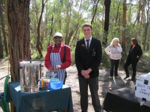 Uncle Herb and student volunteers at the refreshment stall